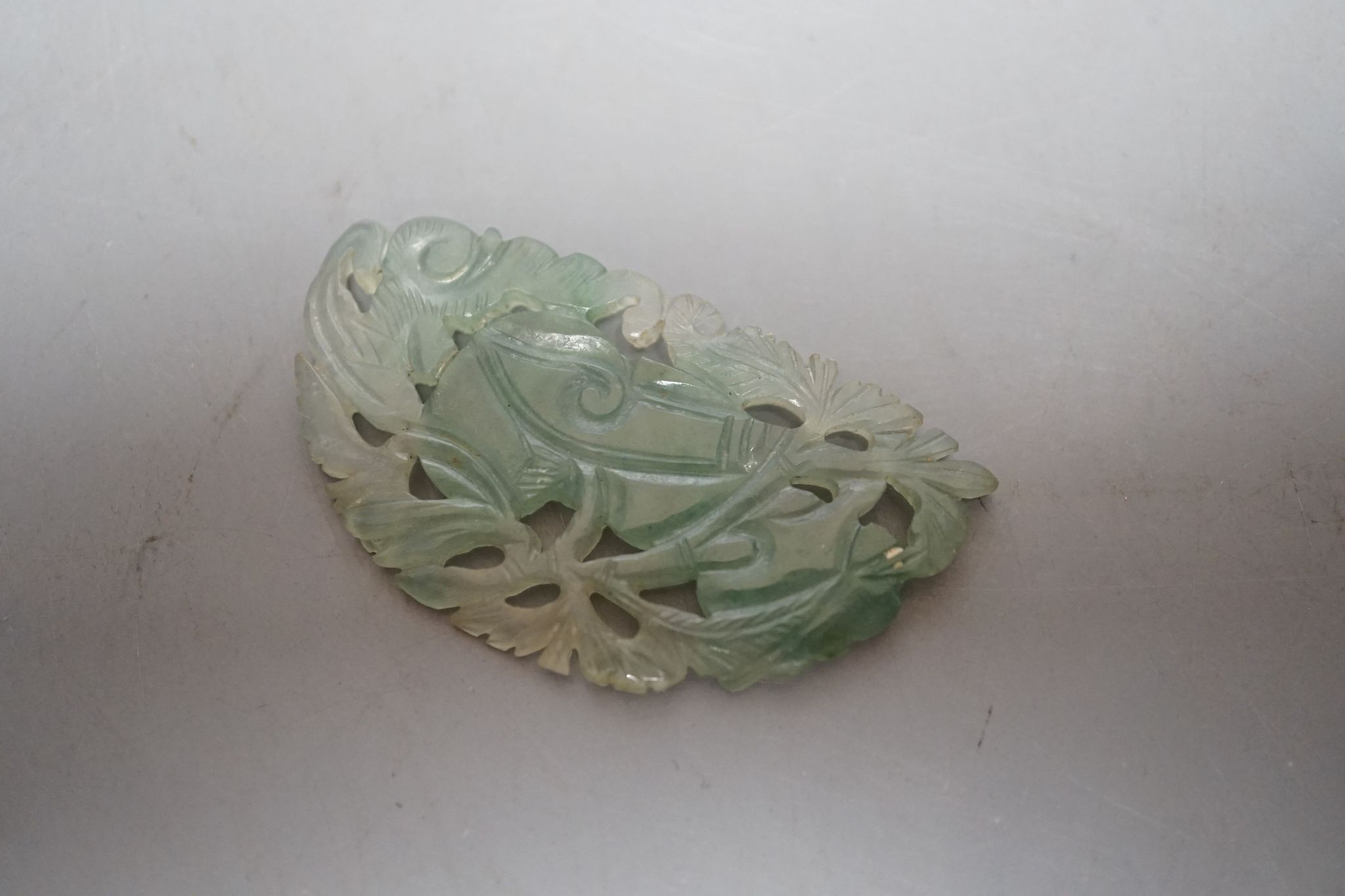 Four Chinese jade carvings of animals and fruit, tallest 4cm